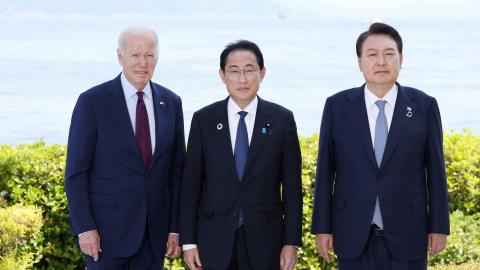 US President Joe Baden, Japanese Prime Minister Fumio Kishida, and South Korean President Yoon Suk Yeol pose prior to the US-South Korea-Japan trilateral meeting on the sidelines of the G7 summit on May 21, 2023, in Hiroshima, Japan. (Asahi Shimbun via Getty Images)