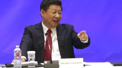 On his first state visit to the United States, Chinese President Xi Jinping speaks during a meeting with five US governors to discuss clean technology and economic development on September 22, 2015, in Seattle, Washington. (Photo by Matt Mills McKnight-Pool/Getty Images)