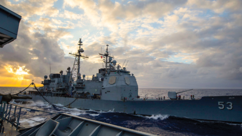Australian Navy vessel HMAS <i>Supply</i> conducts replenishment at sea with US Navy cruiser USS <i>Mobile Bay</i> during RIMPAC 2022. (LSIS Ernesto Sanchez/Australian Defense Force)