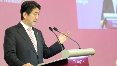 Prime Minister Shinzo Abe delivers his speech at the 13th International Institute for Strategic Studies Shangri-La Dialogue  on May 30, 2014 in Singapore. (ROSLAN RAHMAN/AFP/Getty Images)