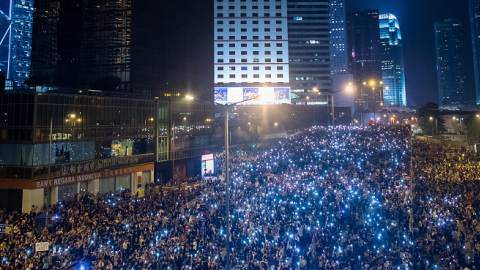Pro-democracy demonstrators gather for the third night in Hong Kong on September 30, 2014. (PHILIPPE LOPEZ/AFP/Getty Images)