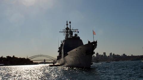 US navy warship, forward-deployed Ticonderoga-class cruiser USS Chosin (CG 65), docks at the Sydney Harbour in front of the Harbour Bridge on October 4, 2013. (SAEED KHAN/AFP/Getty Images)