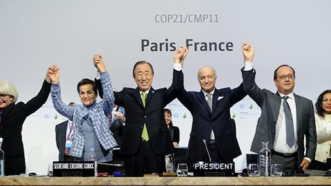 Climate change deal struck at the COP21 Climate Conference in Le Bourget, north of Paris, on December 12, 2015. (Arnaud BOUISSOU/COP21/Anadolu Agency/Getty Images)