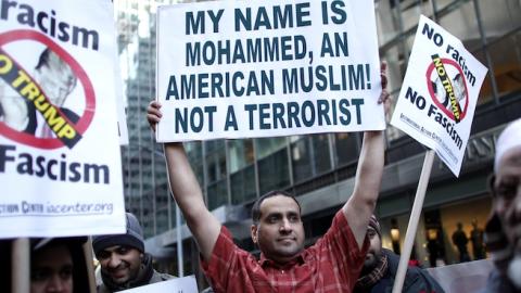 A group of Muslims take part in a rally in front of Trump Tower December 20, 2015 in New York. (KENA BETANCUR/AFP/Getty Images)