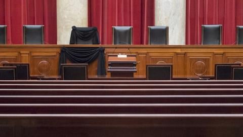 Supreme Court Associate Justice Antonin Scalia's bench chair and the bench in front of his seat are draped in black on Tuesday, February 16, 2016, following his death on February 13, 2016. (Photo By Bill Clark/CQ Roll Call)