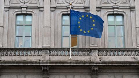 The flag of the European Union flies from the European Parliament information office in the European Quarter on February 25, 2016 in Brussels, Belgium. (Ben Pruchnie/Getty Images)