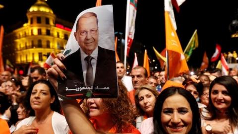 People take part in a celebration after Michel Aoun elected as a President during the Parliamentary session, in Beirut, Lebanon on October 31, 2016. (Ratib Al Safadi/Anadolu Agency/Getty Images)