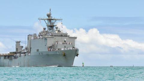 The amphibious dock landing ship USS Rushmore (LSD 47) transits to Joint Base Pearl Harbor-Hickam for the Rim of the Pacific (RIMPAC) 2014 exercise. (U.S. Navy)
