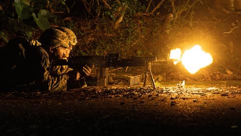 US Marines execute a simulated convoy ambush in Okinawa, Japan, on December 6, 2022. (US Marine Corps Photo by Weston Brown)