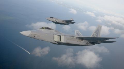 A F-22 Raptor from the 325th Fighter Wing flies alongside a F-35 Lightning II from the 33rd  Fighter Wing over the Emerald Coast. (U.S. Air Force photo by 1st Lt Savanah Bray)