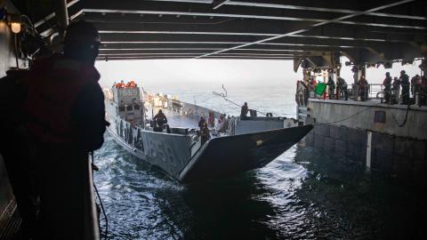 Landing Craft Utility 1659 enters the well deck of the Whidbey Island-class dock landing ship USS Gunston Hall in the Atlantic Ocean on January 26, 2024. (Danielle Serocki via DVIDS)