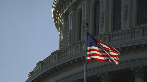 American flags and United States Capitol building are seen in Washington D.C., United States on December 28, 2022. (Celal Gunes/Anadolu Agency via Getty Images)