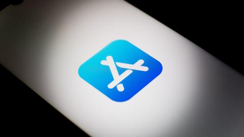 The App Store logo is displayed on a smartphone screen. (Nikolas Kokovlis/NurPhoto via Getty Images)