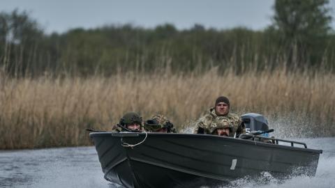 Ukrainian infantrymen from the 126th Territorial Defense Brigade train on the banks of the Dnipro on April 16, 2024, in Kherson Oblast, Ukraine. (Photo by Kostiantyn Liberov/Libkos/Getty Images)
