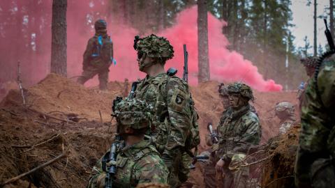 U.S. Army infantry Soldiers with Headquarters and Headquarters “Crusher” Company, 1st Battalion, 187th Infantry Regiment “Leader Rakkasans,” 3rd Brigade Combat Team, 101st Airborne Division (Air Assault), supporting 3rd Infantry Division, wait for further instruction during a force on force exercise near Tapa, Estonia, April 14, 2024.  (U.S. Army photo by Spc. Trey Gonzales)