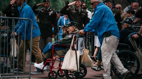 US Army Soldiers, salute a World War II veteran in France on June 6, 2024. (US Army photo by Sgt. Landon Carter)