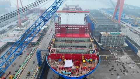 : Aerial view of a ship under construction at a shipbuilding firm on February 28, 2024 in Yangzhou, Jiangsu Province of China. (Photo by Meng Delong/VCG via Getty Images)