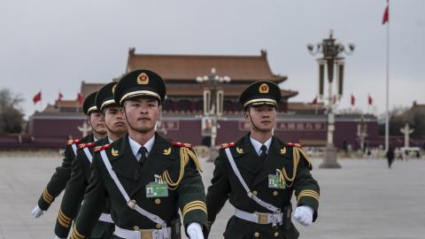 Members of the Peoples Liberation Army flag honor guard march in Tiananmen Square on March 11, 2024, in Beijing, China. (Photo by Kevin Frayer/Getty Images)