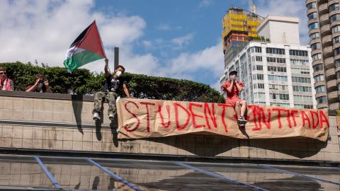 Pro-Palestinian protesters rally outside the Fordham University Lincoln Center on May 1, 2024, in New York City. (Photo by Spencer Platt/Getty Images)