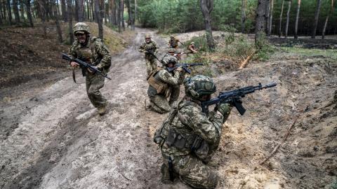 Ukrainian soldiers participate in military training in Kharkiv Oblast, Ukraine, on June 5, 2024. (Jose Colon/Anadolu via Getty Images)