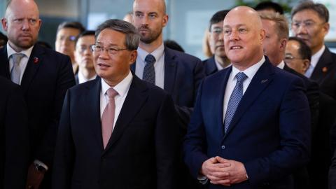 Li Qiang and Christopher Luxon visit the New Zealand Innovation and Productivity Showcase in Auckland, New Zealand, on June 15, 2024. (Photo by Brett Phibbs/AFP via Getty Images)
