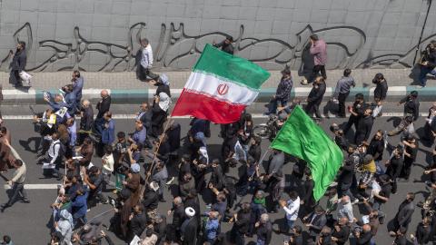 Mourners attend the funeral of Iranian President Ebrahim Raisi on May 22, 2024, in Tehran, Iran. (Majid Saeedi via Getty Images)
