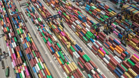 An aerial view shows cargo containers stacked at Yantian port in Shenzhen, China, on June 12, 2024. (Photo by Jade Gao/AFP via Getty Images)