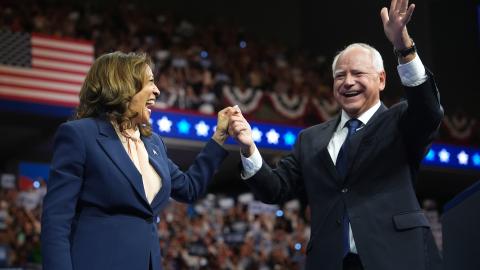 Kamala Harris and Gov. Tim Walz greet supporters during a campaign event on August 6, 2024, in Philadelphia, Pennsylvania. (Andrew Harnik via Getty Images)