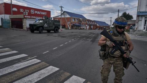 Ukrainian soldiers are seen near the Russian store "Magnit" on August 16, 2024 in Sudzha, Russia. Last week, Ukrainian forces made a surprise incursion into Russia's Kursk region, where Ukraine says it has captured hundreds of enemy soldiers and where Russia has been forced to evacuate more than 130,000 people. (Photo by Kostiantyn Liberov/Libkos/Getty Images)