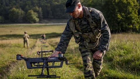 U.S. Army Staff Sgt. Shawn Bailey, a Small Unmanned Aerial System master trainer with the 1st Battalion of the 4th Infantry Regiment, sets up a TS-M800 II drone during Saber Junction 23 at the Joint Multinational Readiness Center near Hohenfels, Germany, Sept. 11, 2023. (DVIDS)