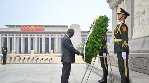 Solomon Islands' Prime Minister Jeremiah Manele lays a wreath at the Monument to the People's Heroes on the Tian'anmen Square in Beijing, capital of China, July 11, 2024. (Li Xiang/Xinhua via Getty Images)