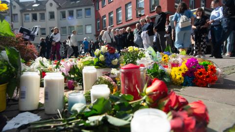 A memorial is set near the entrance of the attack site and in front of Solingen City Church for locals who can bring flowers and candles and write messages after the Solingen attack that kills three people in Solingen, Germany, on August 26, 2024. (Photo by Ying Tang/NurPhoto via Getty Images)