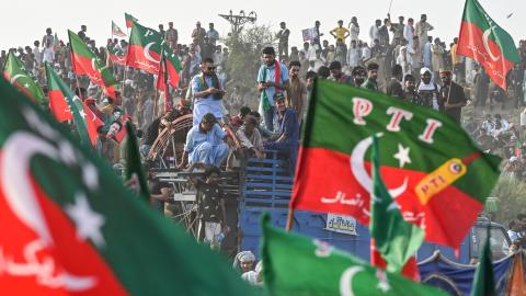 Activists of Pakistan Tehreek-e-Insaf (PTI) party take part in a public rally in Lahore on September 21, 2024. (Arif Ali/AFP via Getty Images)