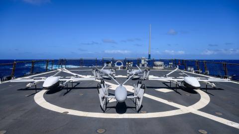 Uncrewed aerial systems from Skyways and PteroDynamics sit on the flight deck of the guidedmissile destroyer USS Curtis Wilbur (DDG 54) on June 25, 2024. (US Navy)