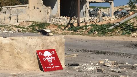 A poison hazard danger sign is seen in the town of Khan Shaykun, Idlib province, Syria on April 05, 2017. On Tuesday more than 100 civilians had been killed and 500 others, mostly children, injured in Assad Regime's suspected chlorine gas attack carried out by warplanes in the town of Khan Shaykun, Idlib province. (Photo by Ogun Duru/Anadolu Agency/Getty Images)