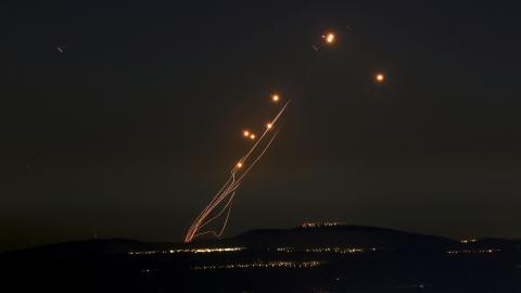Rockets fired from southern Lebanon are intercepted by Israel's Iron Dome air defence in northern Israel on September 27, 2024. (Jalaa Marey/AFP via Getty Images)