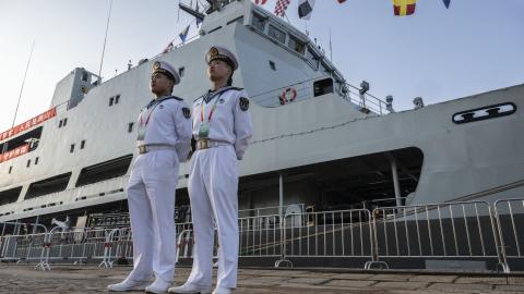 Chinese sailors stand next to a submarine rescue ship Hongzehu from the PLA Navy as it is docked on April 23, 2024, in Qingdao, China.(Kevin Frayer via Getty Images)