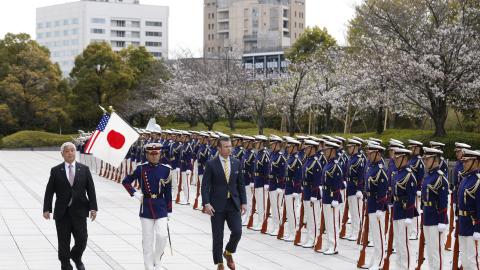 Minister of Defense of Japan Gen Nakatani, left, and U.S. Defense Secretary Pete Hegseth, right, review an honor guard during a welcome ceremony at the Ministry of Defense on March 30, 2025 in Tokyo, Japan. (Kiyoshi Ota Getty Images)