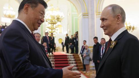 Russian President Vladimir Putin and Chinese President Xi Jinping attend a festive reception for foreign leaders attending celebrations of Victory Day on May 9, 2025. (Getty Images)