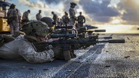 CARIBBEAN SEA (Oct. 14, 2025) U.S. Marine Corps Lance Cpl. Ryan Reyes, assigned to the 22nd Marine Expeditionary Unit (Special Operations Capable), participates in a live-fire range on the flight deck of the Wasp-class amphibious assault ship USS Iwo Jima (LHD 7) while underway in the Caribbean Sea, Oct. 14, 2025. U.S. military forces are deployed to the Caribbean in support of the U.S. Southern Command mission, Department of War-directed operations, and the president’s priorities to disrupt illicit drug tr