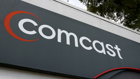 A Comcast sign is seen at one of their centers on February 13, 2014 in Pompano Beach, Florida. (Joe Raedle/Getty Images)