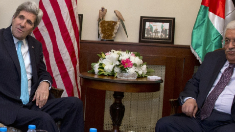 U.S. Secretary of State John Kerry (2nd-R) meets with Palestinian president Mahmud Abbas (R) in the Jordanian capital Amman, on March 26, 2014. (JACQUELYN MARTIN/AFP/Getty Images)