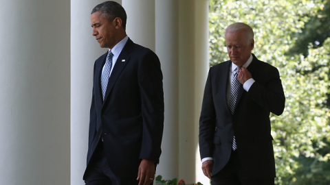 U.S. President Barack Obama and U.S. Vice President Joseph Biden walk into the Rose Garden of the White House June 30, 2014 in Washington, DC. (Mark Wilson/Getty Images)