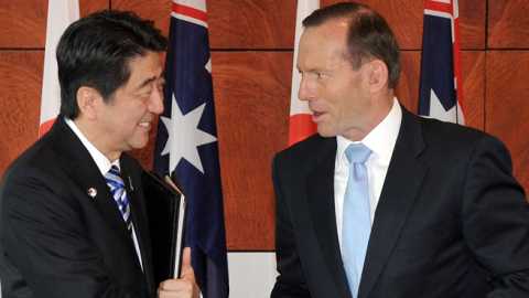 Japanese Prime Minister Shinzo Abe (L) and Australian Prime Minister Tony Abbott (R) at Parliament House in Canberra on July 8, 2014. (MARK GRAHAM/AFP/Getty Images)