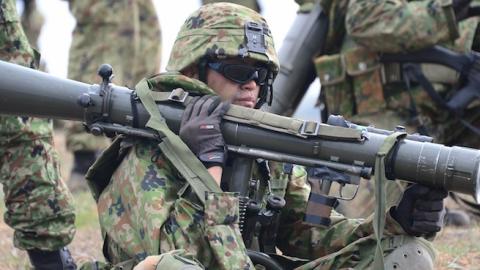 A soldier from the Japan Ground Self-Defense Force carries an 84mm Carl Gustav rocket launcher during Exercise Iron Fist 2014, a joint-exercise with US Marines and sailors at Camp Pendleton on February 9, 2014. (FREDERIC J. BROWN/AFP/Getty Images)