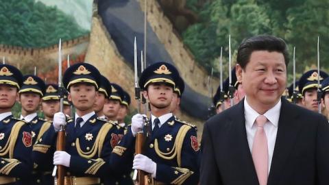 Chinese President Xi Jinping views an honour guard during a welcoming ceremony inside the Great Hall of the People on March 26, 2015 in Beijing, China. (Feng Li/Getty Images)