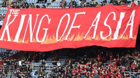 Supporters of Guangzhou Evergrande of China display a huge banner before the start of the third-place Club World Cup football match in Yokohama on December 20, 2015. (TORU YAMANAKA/AFP/Getty Images)