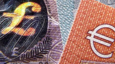 A detail of a twenty Pound bank note with hologram design and a five and ten Euro note, on March 7, 2016 in London, England. (Jim Dyson/Getty Images)
