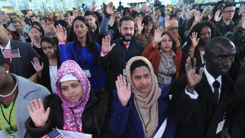 Candidates for U.S. Citizenship are sworn in during the Naturalization Ceremony at Festival PEOPLE En Espanol 2015 presented by Verizon at Jacob Javitz Center on October 18, 2015 in New York City. (Brad Barket/Getty Images for PEOPLE En Espanol)