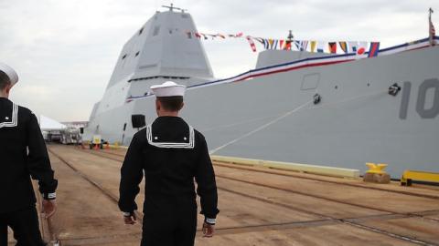 Sailors walk past the US Navy's new guided missile destroyer DDG 1000 USS Zumwalt on October 13, 2016 in Baltimore, Maryland. (Mark Wilson/Getty Images)